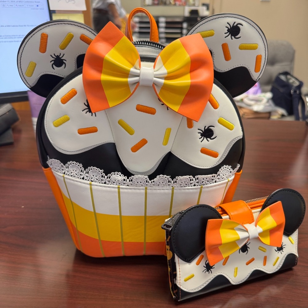Loungefly Minnie Mouse candy corn cupcake glow backpack with wallet